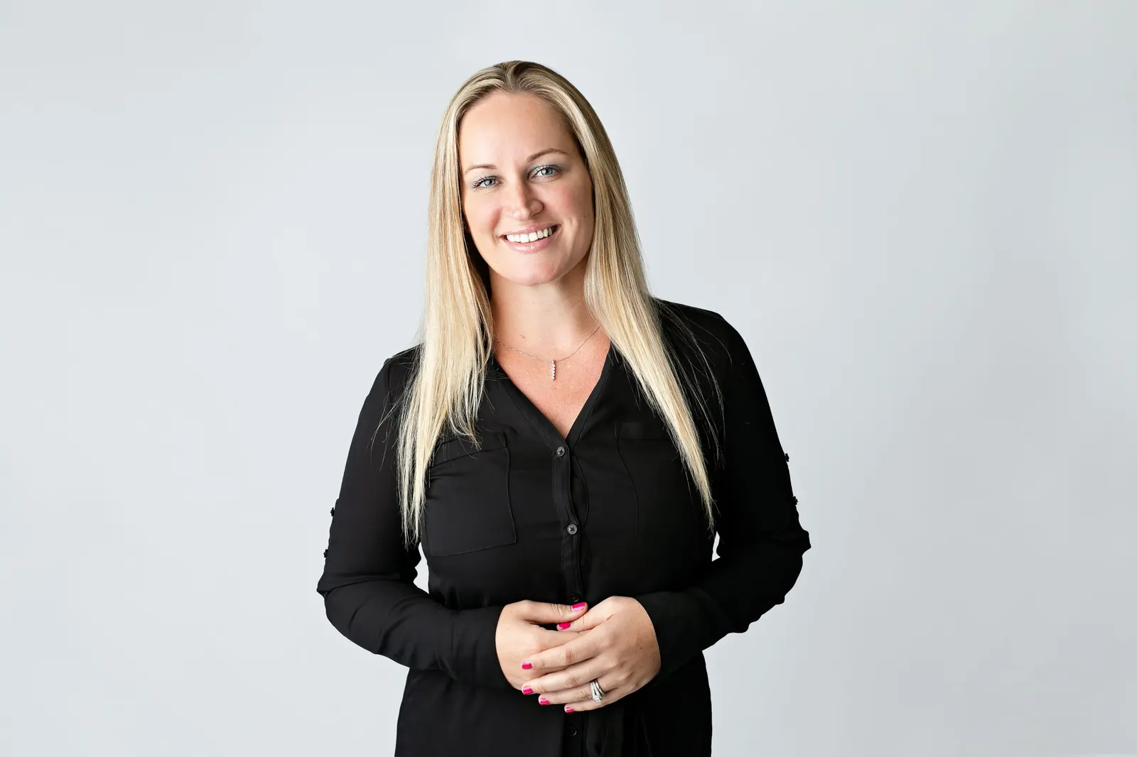 Jessica Ferran, South Florida real estate agent, smiling